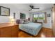 Comfortable bedroom with natural light and hardwood floors at 2382 Whites Mill Ln, Decatur, GA 30032