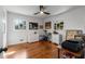 Bright bedroom with hardwood floors, a ceiling fan, and lots of natural light from two windows at 2382 Whites Mill Ln, Decatur, GA 30032