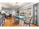 Bright living room with hardwood floors, large windows, and stylish furnishings at 2382 Whites Mill Ln, Decatur, GA 30032