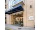 Exterior building entrance featuring a covered entryway and glass doors at 905 Ju Ne Street Ne St, Atlanta, GA 30309