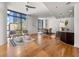 Open living space with hardwood floors, a dining area, and a breakfast bar for casual dining and socializing at 905 Ju Ne Street Ne St, Atlanta, GA 30309