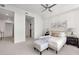 Spacious main bedroom with a seating area and a ceiling fan at 905 Ju Ne Street Ne St, Atlanta, GA 30309