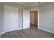 Bedroom showcasing modern wood-look flooring and neutral wall paint at 109 Sunflower Ne Cir, Cartersville, GA 30121