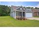 Charming home featuring a two-car garage and inviting landscaping at 109 Sunflower Ne Cir, Cartersville, GA 30121