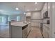 Modern kitchen with white cabinets, granite countertops, stainless appliances and an island at 109 Sunflower Ne Cir, Cartersville, GA 30121