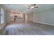 Spacious open floor plan with wood floors, kitchen view, and stone fireplace, great for entertaining at 109 Sunflower Ne Cir, Cartersville, GA 30121