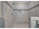Close-up of the spacious shower with decorative tile surround and shower niche at 109 Sunflower Ne Cir, Cartersville, GA 30121