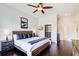 Luxurious bedroom boasts hardwood floors, a queen-sized bed, and an open closet at 1418 Dresden Ne Dr # 385, Brookhaven, GA 30319
