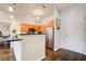 Modern kitchen featuring stainless steel appliances, wooden cabinets, and a stylish countertop with pendant lighting at 1418 Dresden Ne Dr # 385, Brookhaven, GA 30319