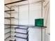 Organized walk-in closet with custom shelving and storage solutions, maximizing space and functionality at 1418 Dresden Ne Dr # 385, Brookhaven, GA 30319