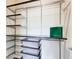 Organized walk-in closet with shelving units, storage solutions, and ample space at 1418 Dresden Ne Dr # 385, Brookhaven, GA 30319