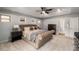 Main bedroom features a trey ceiling, ceiling fan, carpet flooring, and multiple windows at 1520 Gallant Fox Ln, Suwanee, GA 30024
