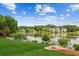 Sprawling backyard overlooks a picturesque lake at 2045 Calmwater Ct, Suwanee, GA 30024
