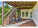 Backyard patio area with stairs leading to the upper level, offering outdoor access and space for relaxation at 2045 Calmwater Ct, Suwanee, GA 30024