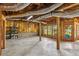 Unfinished basement with exposed ductwork and framing, providing a blank canvas for future expansion and customization at 2045 Calmwater Ct, Suwanee, GA 30024