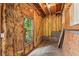 Unfinished basement features exposed insulation, framing, and natural light through a window at 2045 Calmwater Ct, Suwanee, GA 30024