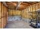 Unfinished basement is ready for customization and features exposed beams at 2045 Calmwater Ct, Suwanee, GA 30024