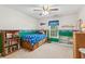 Cozy bedroom is decorated with playful, baseball-themed décor and ample storage at 2045 Calmwater Ct, Suwanee, GA 30024