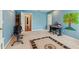 Spacious bonus room with lots of natural light, piano, and an exercise bike at 2045 Calmwater Ct, Suwanee, GA 30024