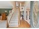 Inviting foyer with a grand staircase, hardwood floors, and a bright, airy atmosphere at 2045 Calmwater Ct, Suwanee, GA 30024