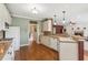 Open kitchen area with hardwood floors and modern appliances at 2045 Calmwater Ct, Suwanee, GA 30024