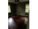 Bedroom with hardwood floors, two windows for natural light, and a ceiling fan at 2226 Medfield Ne Trl, Atlanta, GA 30345