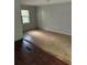 Open living room with mixed flooring and natural light at 2226 Medfield Ne Trl, Atlanta, GA 30345