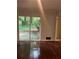 Living space with sliding glass doors opening to a backyard retreat at 2226 Medfield Ne Trl, Atlanta, GA 30345