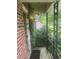 Side porch with iron railing and view of the yard at 2226 Medfield Ne Trl, Atlanta, GA 30345