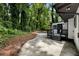 Back of the house with small porch and steps that provide access to the backyard at 4720 Shoshonee Trl, College Park, GA 30349