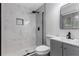 Bathroom with white marble shower, modern fixtures and gray vanity at 4720 Shoshonee Trl, College Park, GA 30349
