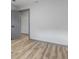 A simple bedroom with light wood floor and neutral wall at 4720 Shoshonee Trl, College Park, GA 30349