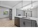 The spacious kitchen includes a breakfast bar and stainless steel appliances at 4720 Shoshonee Trl, College Park, GA 30349