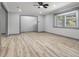 Spacious living room with large bay window, allowing for lots of natural light at 4720 Shoshonee Trl, College Park, GA 30349