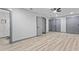 Spacious main bedroom with wood floors, neutral walls, and an ensuite bathroom at 4720 Shoshonee Trl, College Park, GA 30349