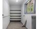 A storage room with multiple shelves at 4720 Shoshonee Trl, College Park, GA 30349