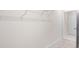 Spacious walk-in closet with wire shelving and neutral carpeting at 131 Prominence Ct, Canton, GA 30114