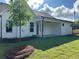 Backyard features a covered patio and a lush, green lawn at 204 Saratoga Dr, Acworth, GA 30102