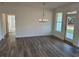 Open dining room featuring modern lighting and natural light at 204 Saratoga Dr, Acworth, GA 30102