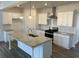 Modern kitchen with stainless steel appliances, granite countertops, and large island at 204 Saratoga Dr, Acworth, GA 30102