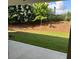 Tranquil view from the patio showcases the manicured backyard and privacy at 204 Saratoga Dr, Acworth, GA 30102