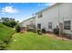 Inviting backyard with manicured lawn and patio, ideal for outdoor living at 208 Magnolia Leaf Dr, Woodstock, GA 30188