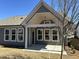 Rear exterior with covered porch and multiple windows for plenty of natural light at 208 Saratoga Dr, Acworth, GA 30102