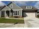 Charming single-Gathering home with a well-maintained lawn, two-car garage and inviting curb appeal at 208 Saratoga Dr, Acworth, GA 30102
