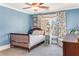 Bright bedroom with colorful curtains, a comfortable bed, and a window with natural light at 2217 Virginia Ne Pl, Atlanta, GA 30305
