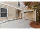 Exterior view of the detached garage with a concrete driveway and siding that matches the house at 2217 Virginia Ne Pl, Atlanta, GA 30305