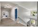 Upstairs hallway features hardwood railing, recessed lighting, and neutral carpet at 2217 Virginia Ne Pl, Atlanta, GA 30305