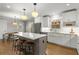 A gourmet kitchen featuring stainless steel appliances, granite countertops, and an island with seating at 2217 Virginia Ne Pl, Atlanta, GA 30305