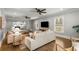 Open living room featuring hardwood floors, recessed lighting, ceiling fans, and ample seating at 2217 Virginia Ne Pl, Atlanta, GA 30305