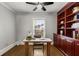 Bright office with a built in cherry bookshelf and dark wood flooring at 2217 Virginia Ne Pl, Atlanta, GA 30305
